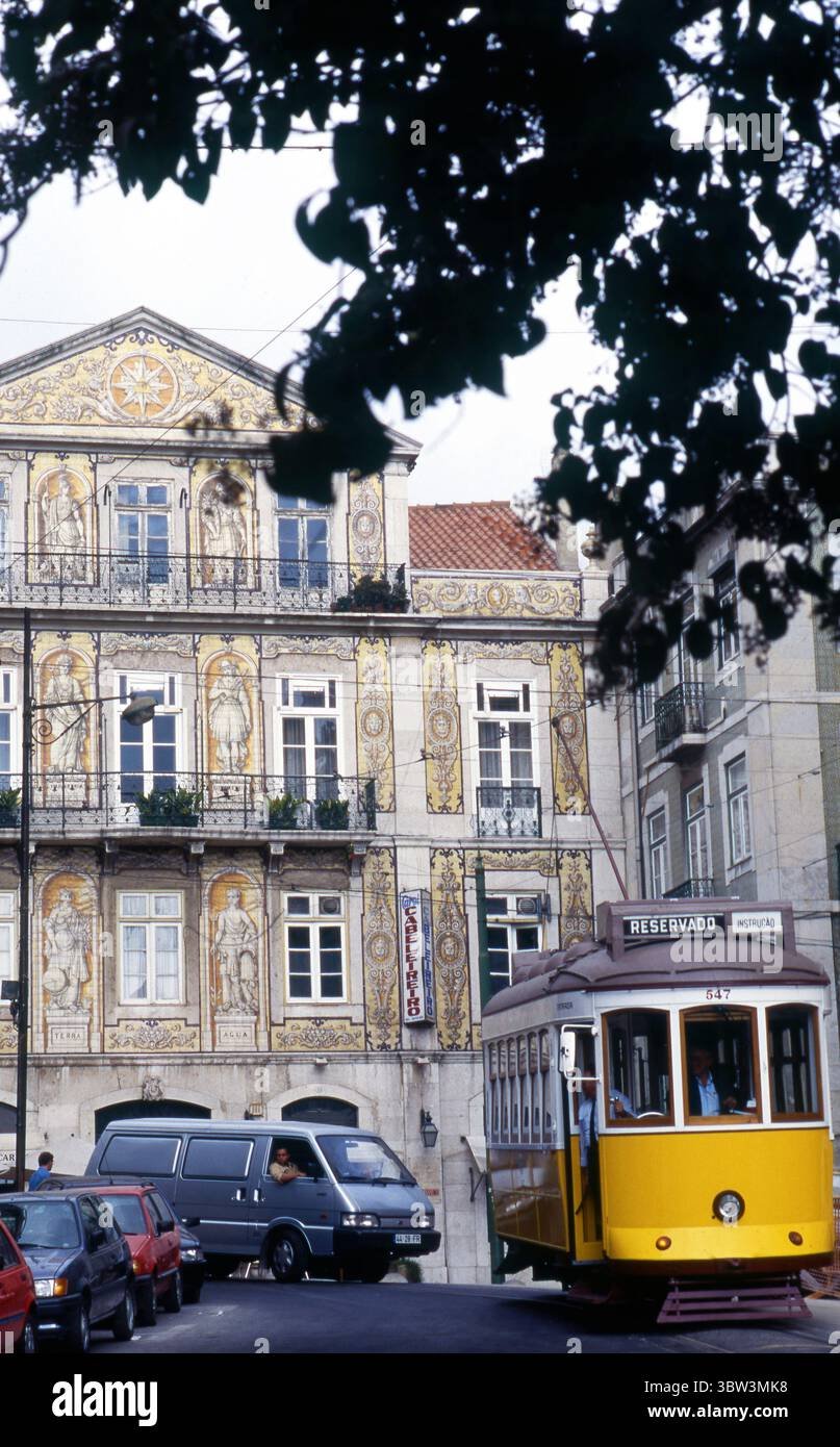 1990s Lisbon Portugal Azulejo‑Clad Façade with Iconic Yellow Tram